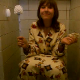 A home video clip from Eastern Europe featuring a girl in her pajamas using the toilet. We are not sure if she is peeing, pooping, or both.